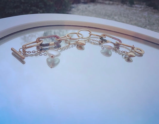 Fantasy-Armband mit Details in Perlen- und Herzoptik - Trouver La Mode